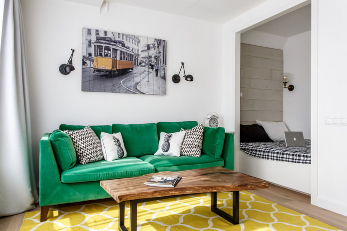 niche with a bed in a one-room apartment