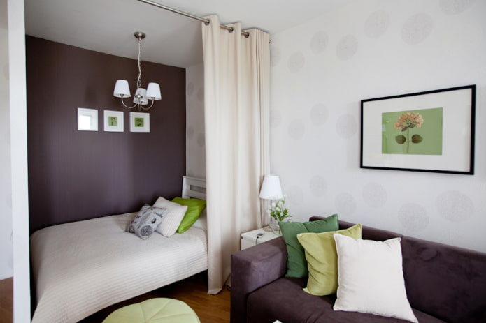 niche with a bed in a one-room apartment