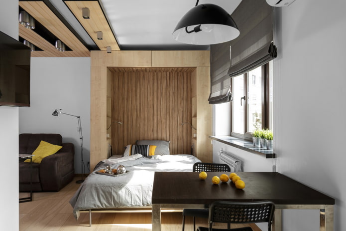 niche with a bed in the interior of the apartment