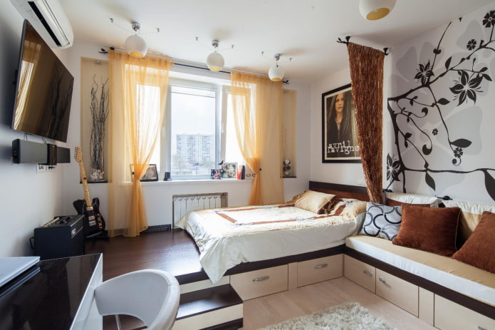 bed on a podium in a one-room apartment