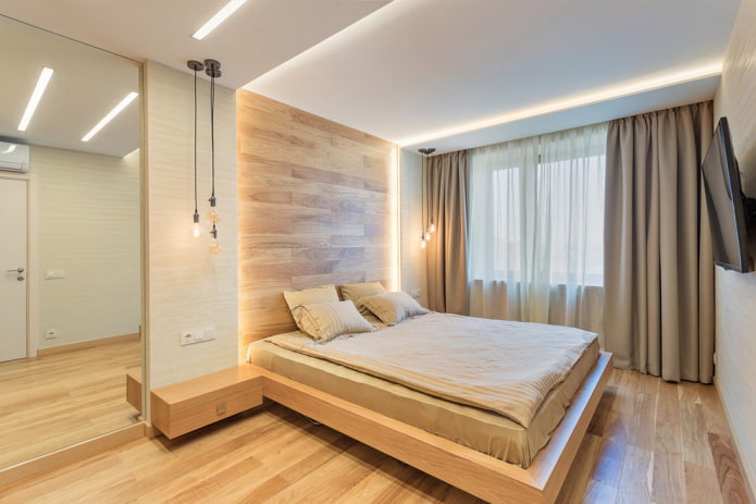 wooden bed without a backrest in the interior