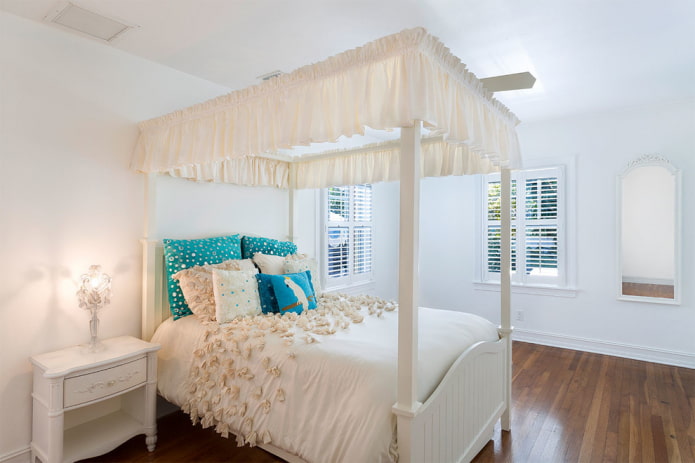 white wooden bed in the interior
