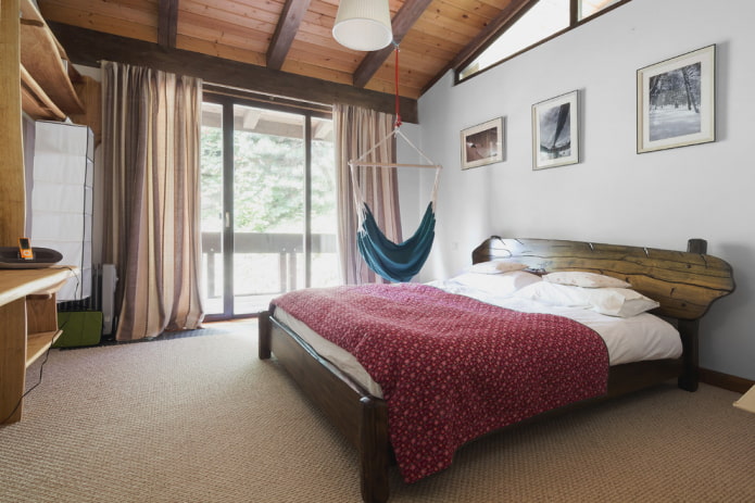 wooden bed in the bedroom