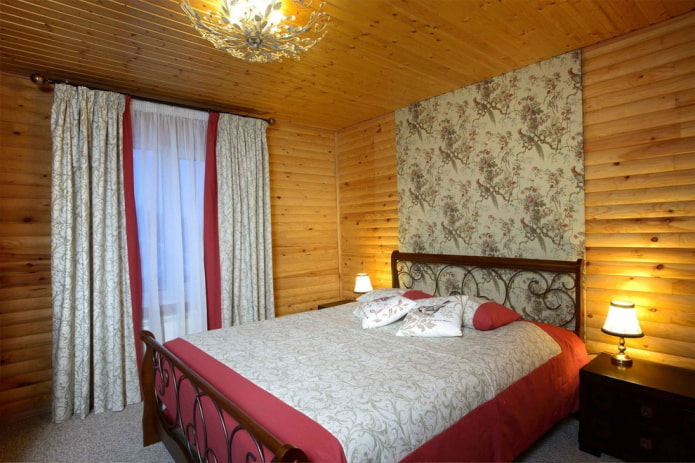 wooden bed with forged elements