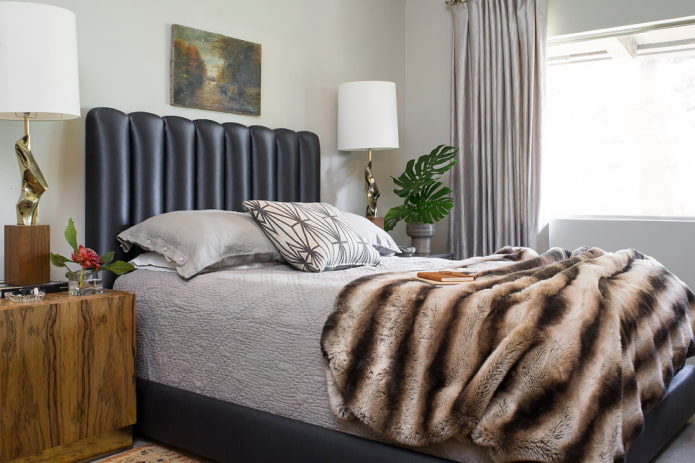bed with a leather headboard in the interior