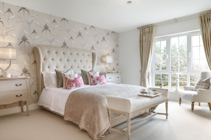 bed with beige headboard in the interior