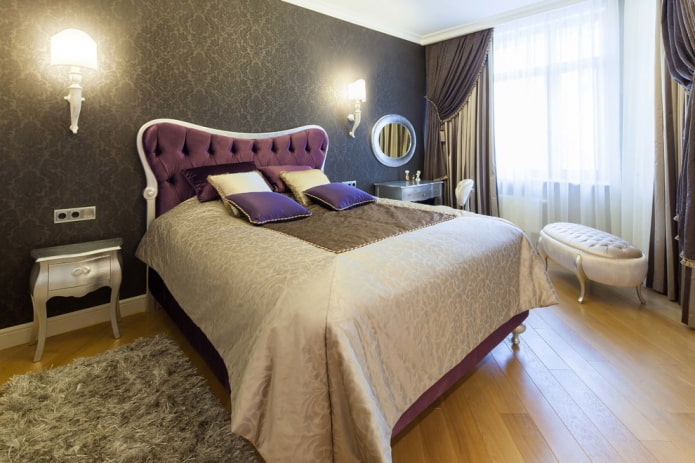 bed with a purple headboard in the interior