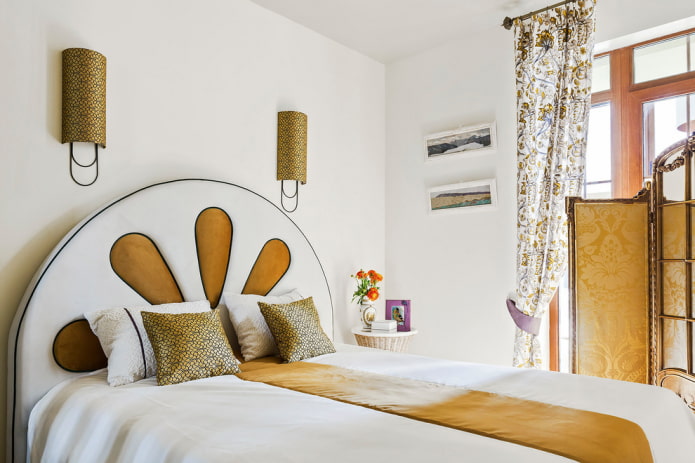 bed with a round headboard in the interior