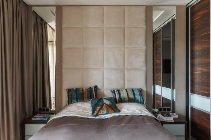 bed with a soft headboard in a modern style