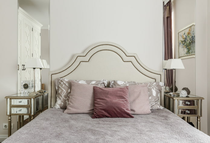 bed with figured headboard made of eco-leather in the interior
