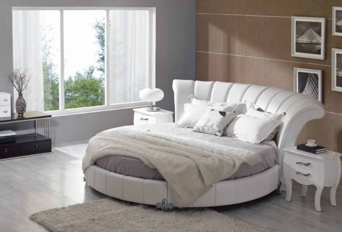 bed with curved headboard in the interior