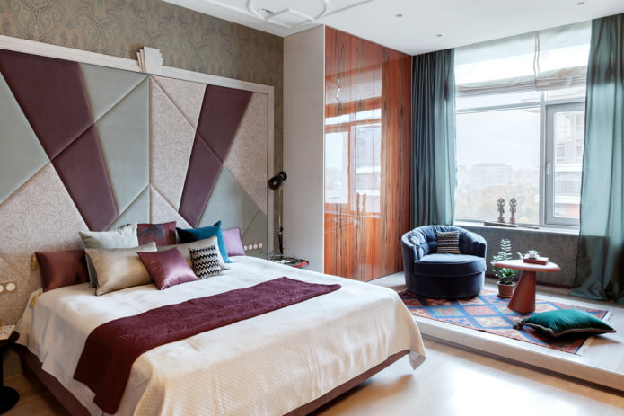 bed with a large headboard in the interior