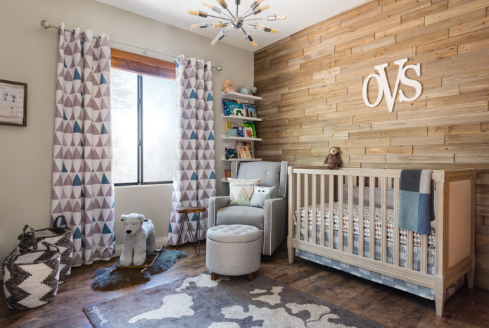 beige crib for a baby in the interior