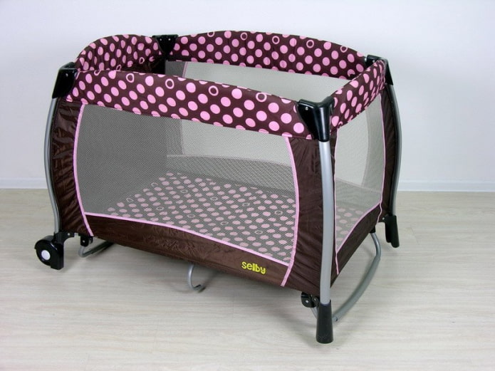 crib-playpen for a newborn in the interior