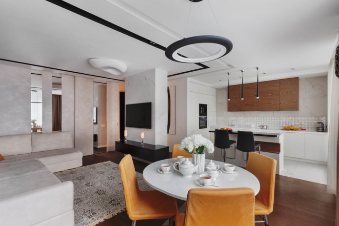 round table in the interior of the kitchen-living room