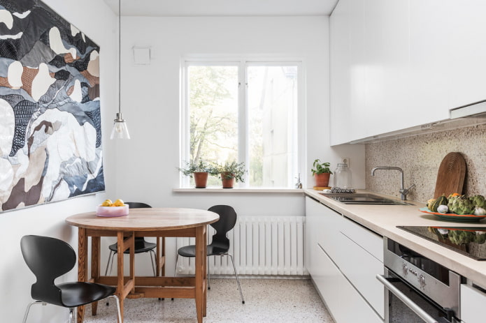 round brown table in the kitchen interior