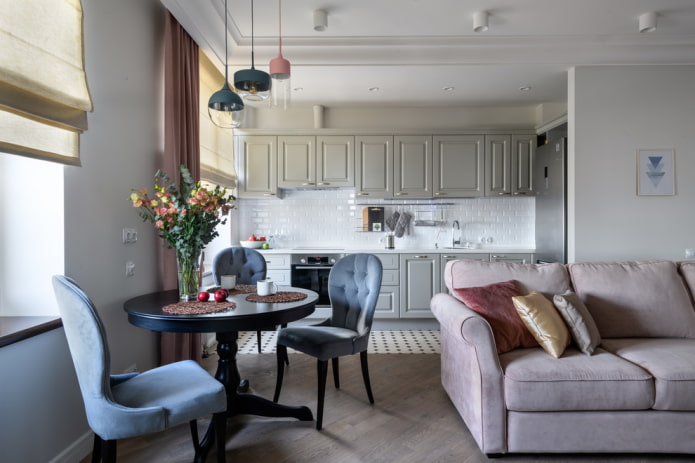 round table in the interior of the kitchen-living room