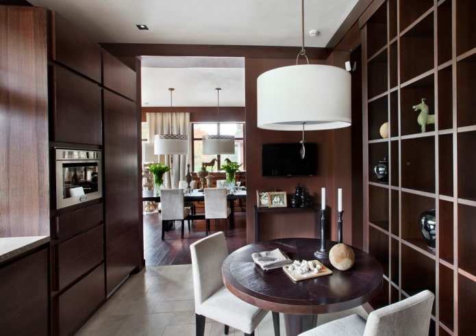 round table in wenge color in the kitchen interior