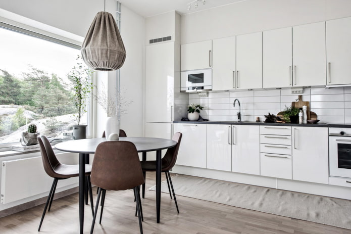 round black table in the kitchen interior