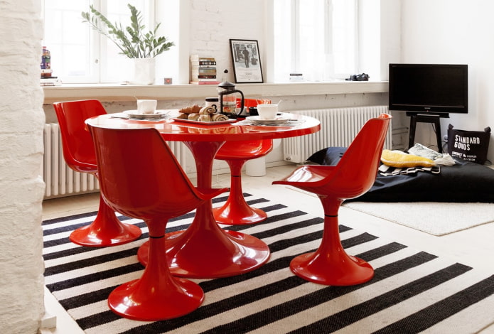 round red table in the kitchen-living room interior