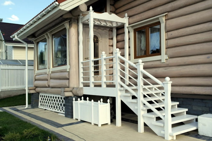 white porch of a wooden house