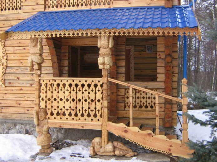 carved porch near the house