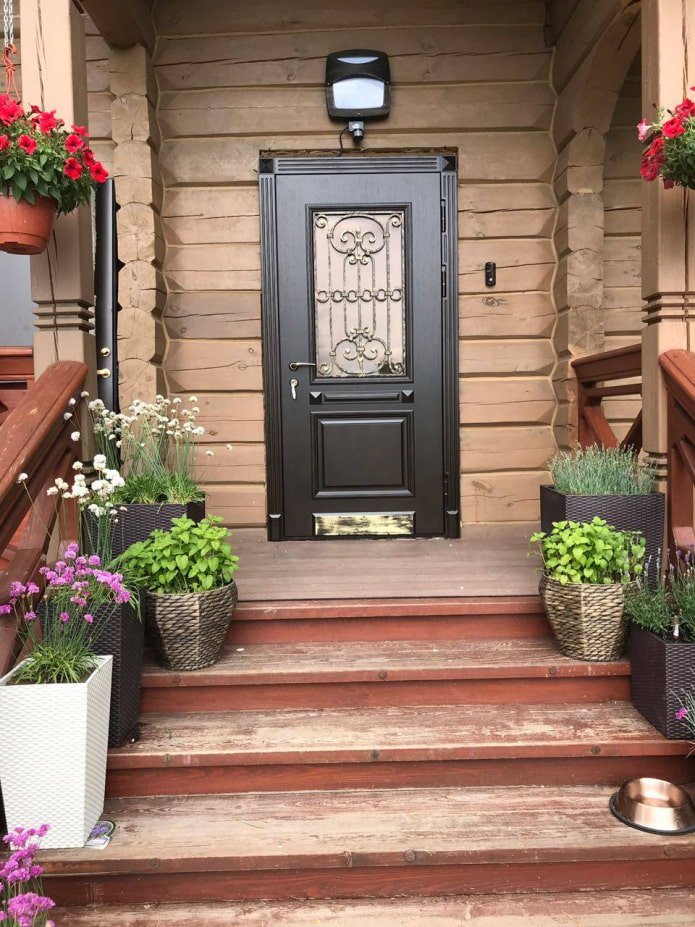 flowers on the porch near the house