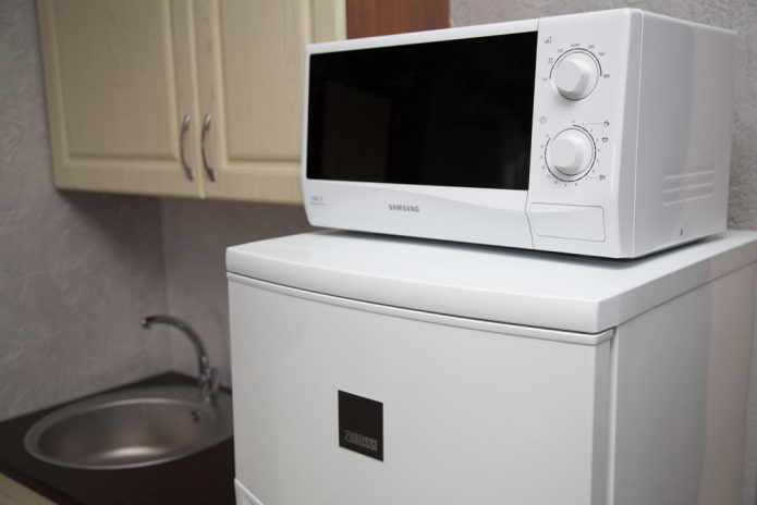 Microwave oven on the refrigerator