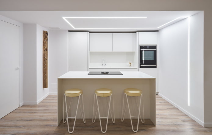 White ceiling with backlighting in the kitchen