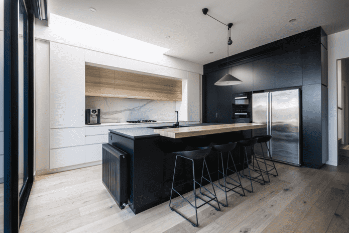 White kitchen with black furniture
