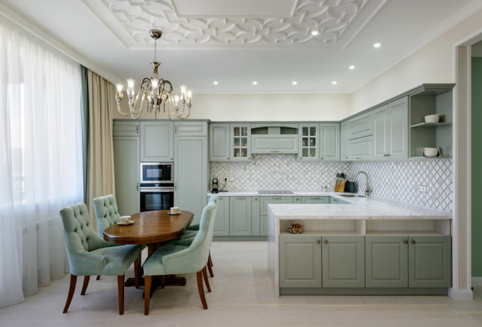 U-shaped kitchen in pistachio tones