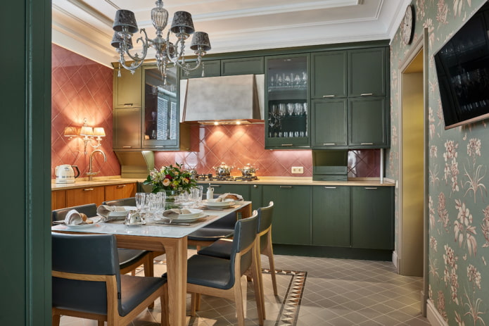 A chandelier with lampshades and wall sconces in the kitchen