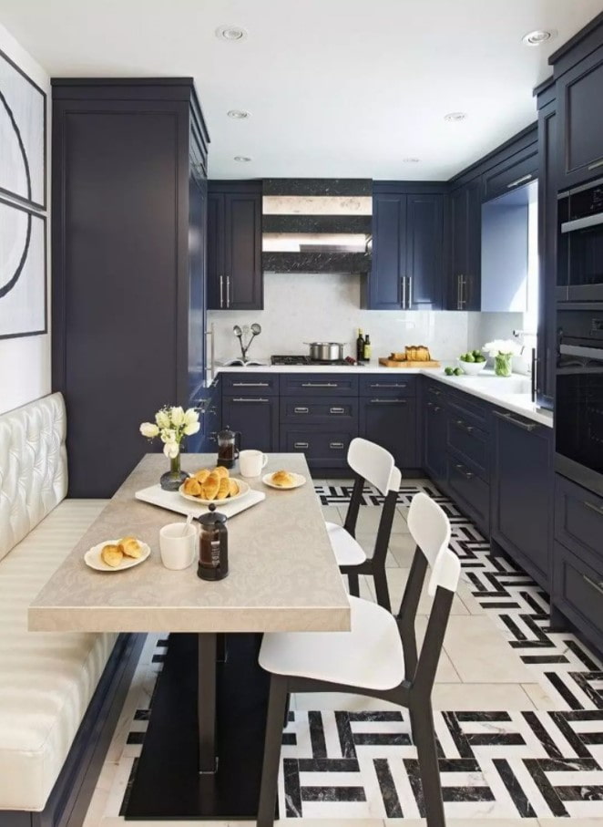 U-shaped kitchen with a sofa