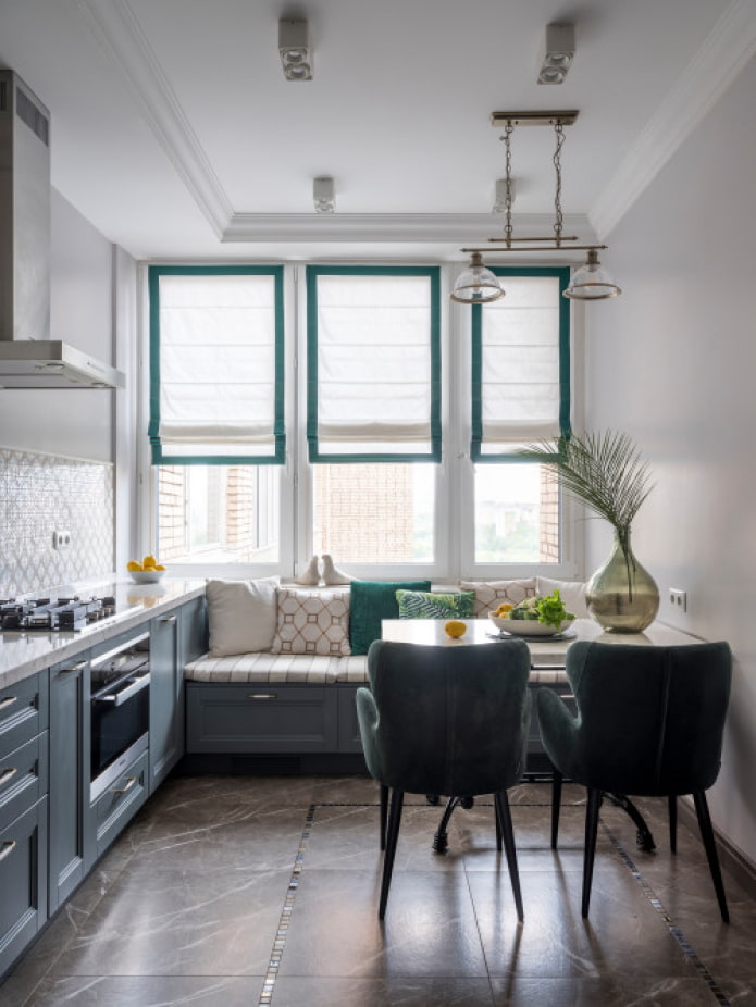 sofa under the window in the kitchen