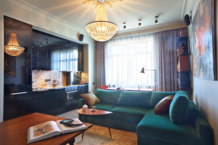location of the sofa in the interior of the kitchen-living room
