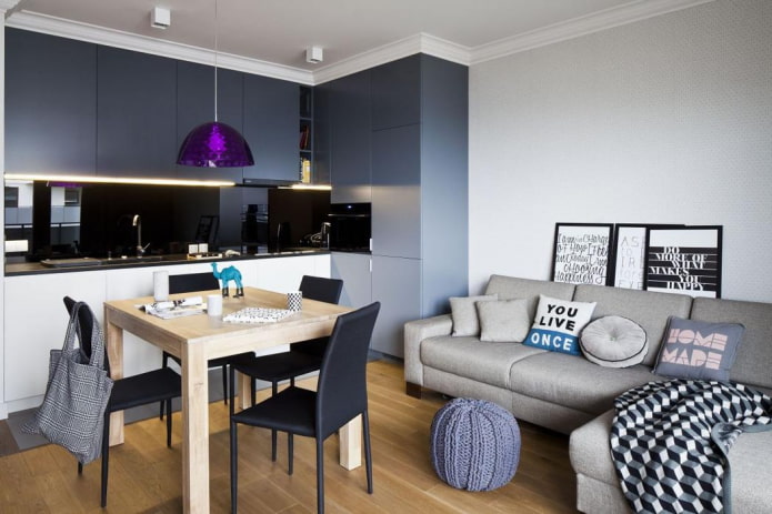 arrangement of the sofa in the interior of the kitchen-living room