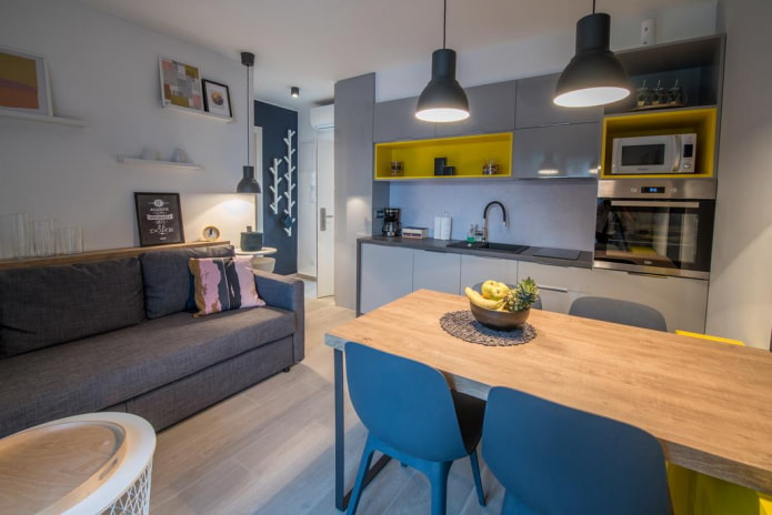 arrangement of a kitchen-living room of 16 square meters