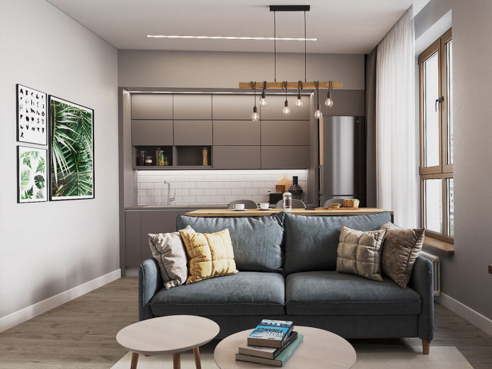sofa in the interior of the kitchen-living room of 16 square meters