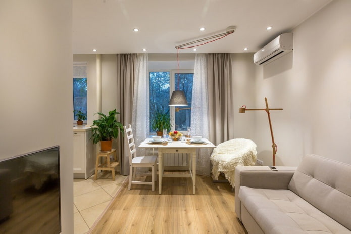 furniture arrangement in the interior of the kitchen-living room