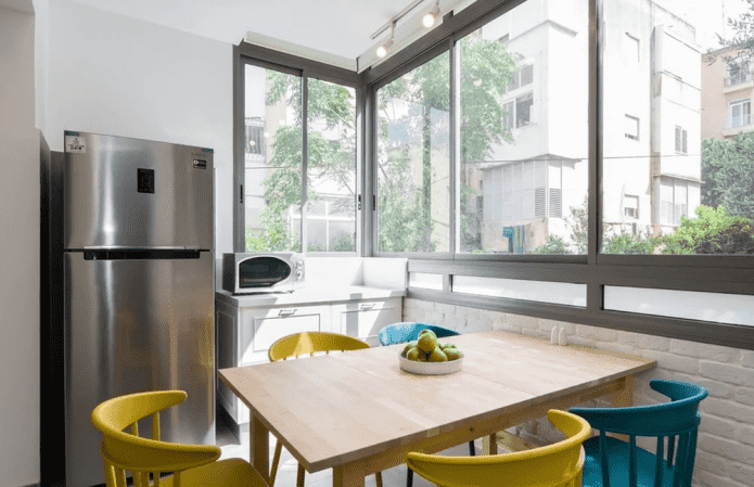 full transfer of the kitchen to the loggia