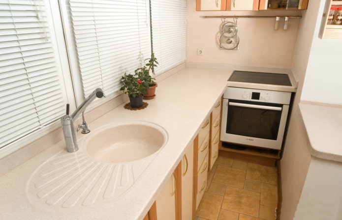 full transfer of the kitchen to the loggia