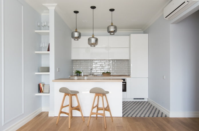 white kitchen in a niche in the interior