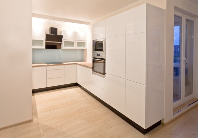kitchen in a niche in the interior in the minimalist style