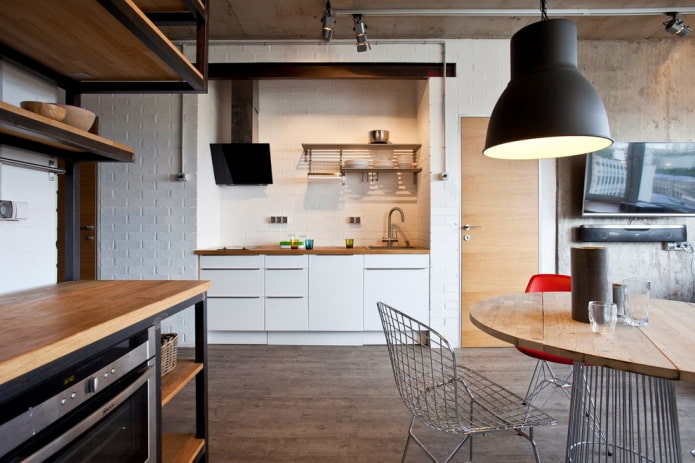 kitchen in a niche in the interior in the loft style