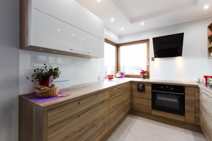 kitchen with wooden and white facades