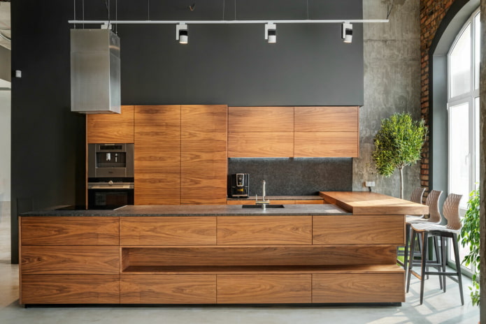 black kitchen with wood