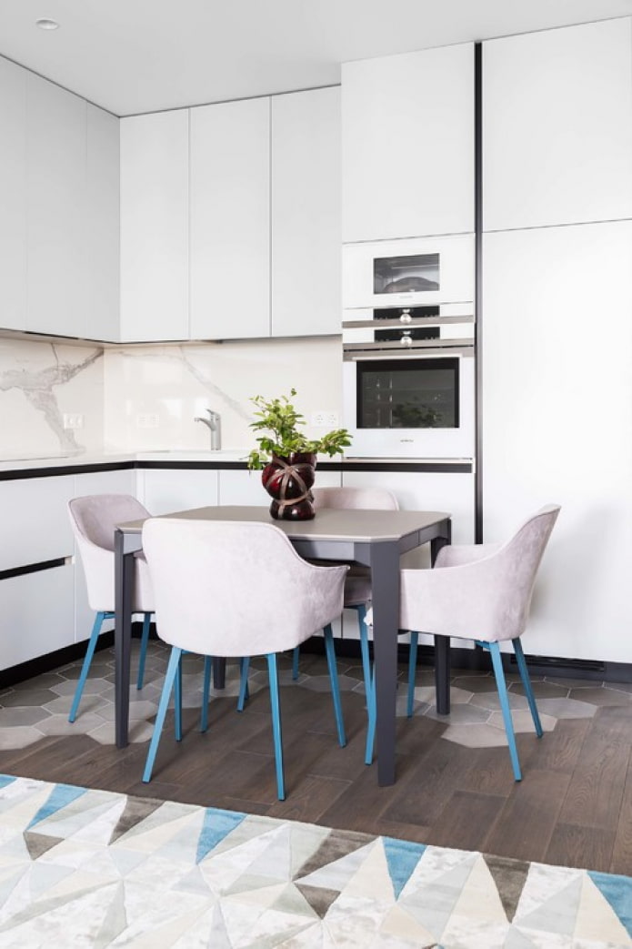 white kitchen with a table