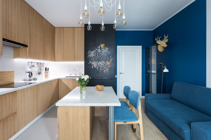 blue sofa in the kitchen interior