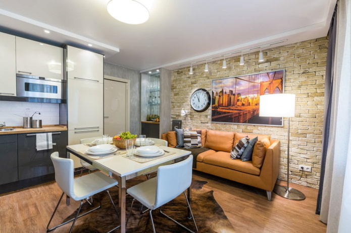 sofa in the kitchen interior in loft style