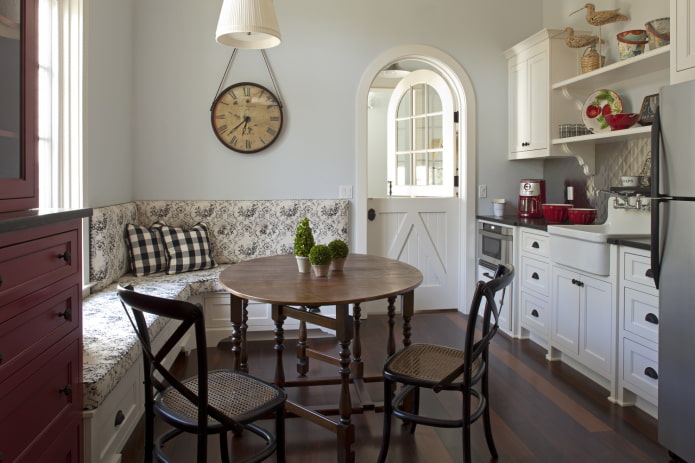 sofa in the kitchen interior in the country style